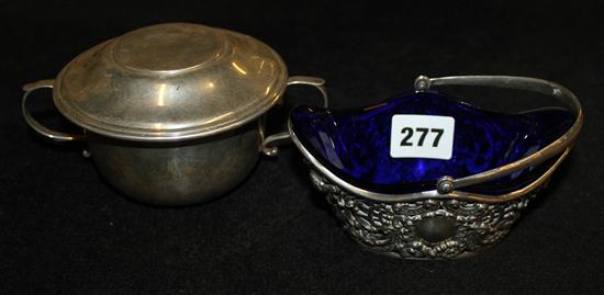 Silver porringer and cover and a sugar basket